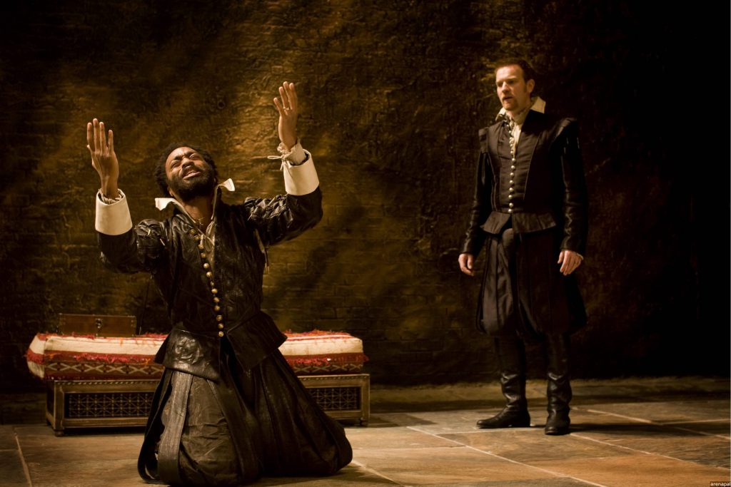 Chiwetel Ejiofor as Othello ; Ewan McGregor as Iago